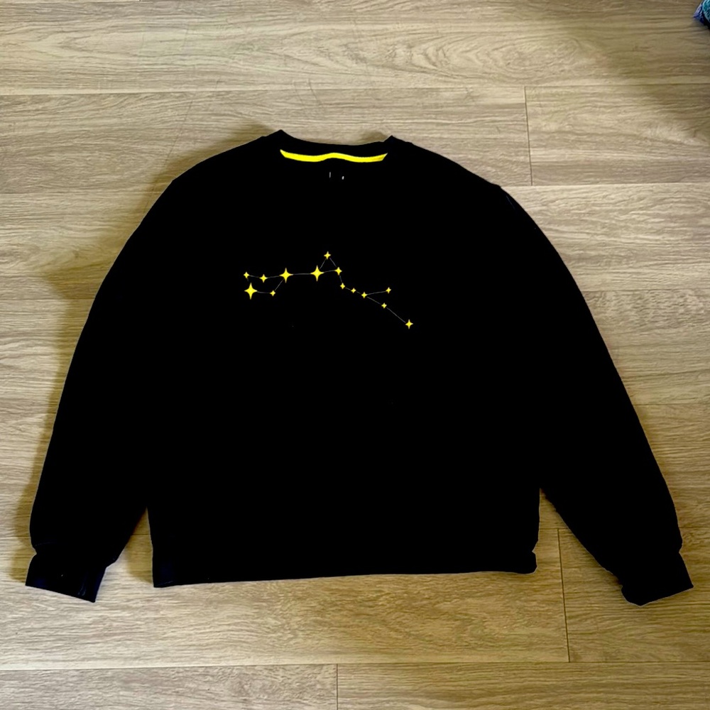 Black Sweatshirt with Yellow Star Constellation Design
